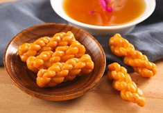 黄精茶携手众望小麻花，咸宁两产品启用“荆楚放心礼”标识，助力地方品牌升级